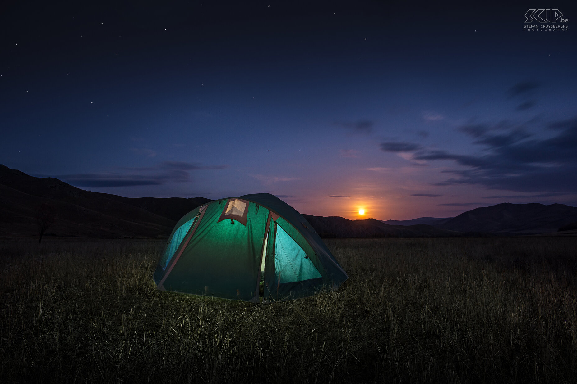 Khan Khentii - Tent and full moon We camped and slept in a tent so the last night I tried to make a night photo of our enlightened tent and the rising full moon. The day after we went back home. Stefan Cruysberghs